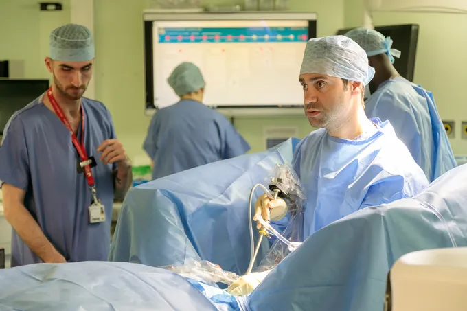 Dr Marios Hadjipavlou performing a urological procedure in the operating theatre